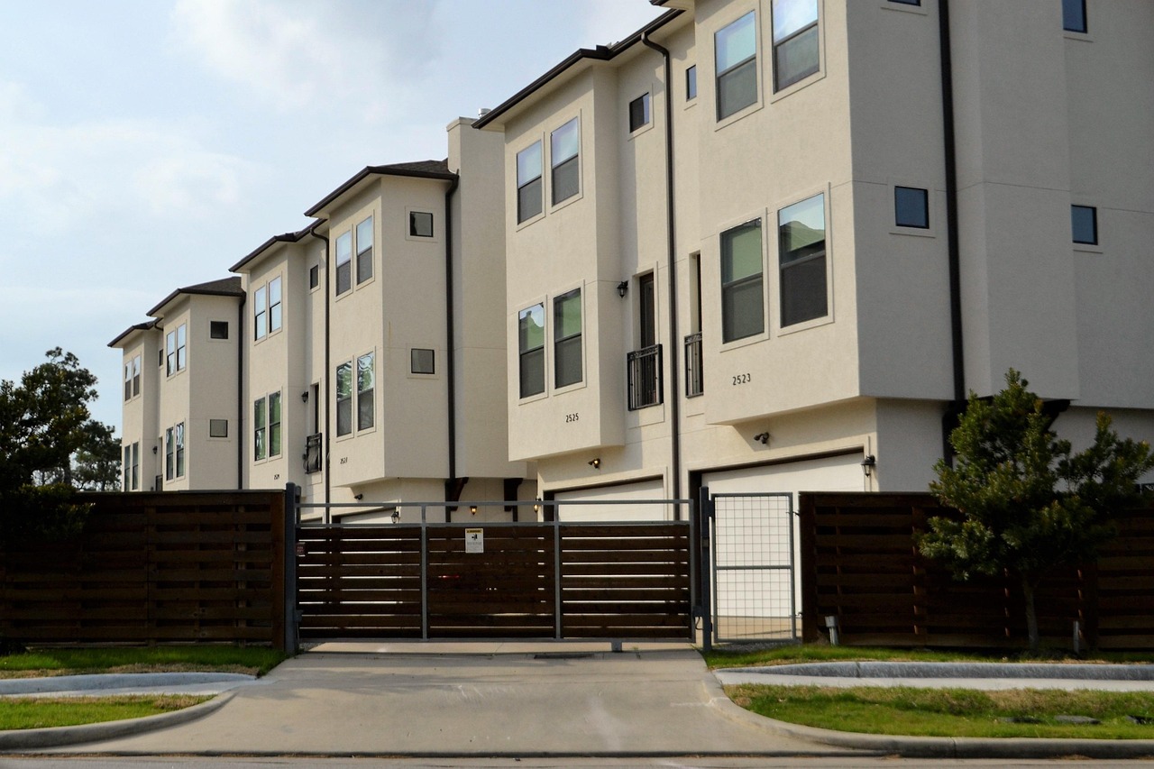 real-estate, for rent, rented, driveway, gated community, duplex, residential, architecture, outdoors, house, nature, facade, building, window, street, pavement, daylight, sky, exterior, apartment, town, home, estate, real, modern, property, design, housing, structure, residence, set, collection, townhouse, rental, brown, fence, gate, grass, mowed, lawn, occupied, occupy, investment, people, real life, brokerage, dwelling, affordable, low income housing, middle class, lower class, first apartment, hotel, townhouse check point, houston, texas, check-point, rent, business, on post, security, guard, guard house, security post, post, alert, ready, safety, gates, lock-down, locked, closed, firm, real estate, street side, entrance, enter, development, apartment complex, houston texas, town house, red, black gate, gated, secured, security gate